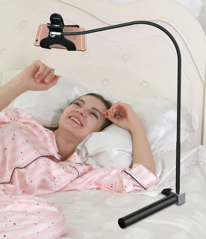 Black mobile phone bed bracket with adjustable overhead arm holding smartphone