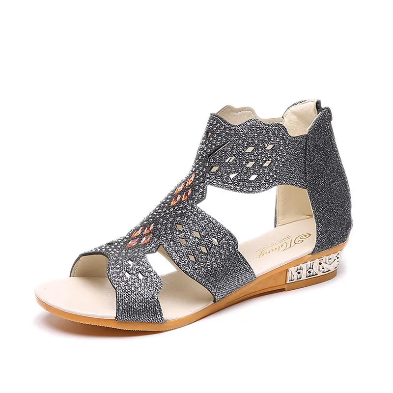 Women's flat open toe sandals with rhinestone detail and back zipper in beige colour