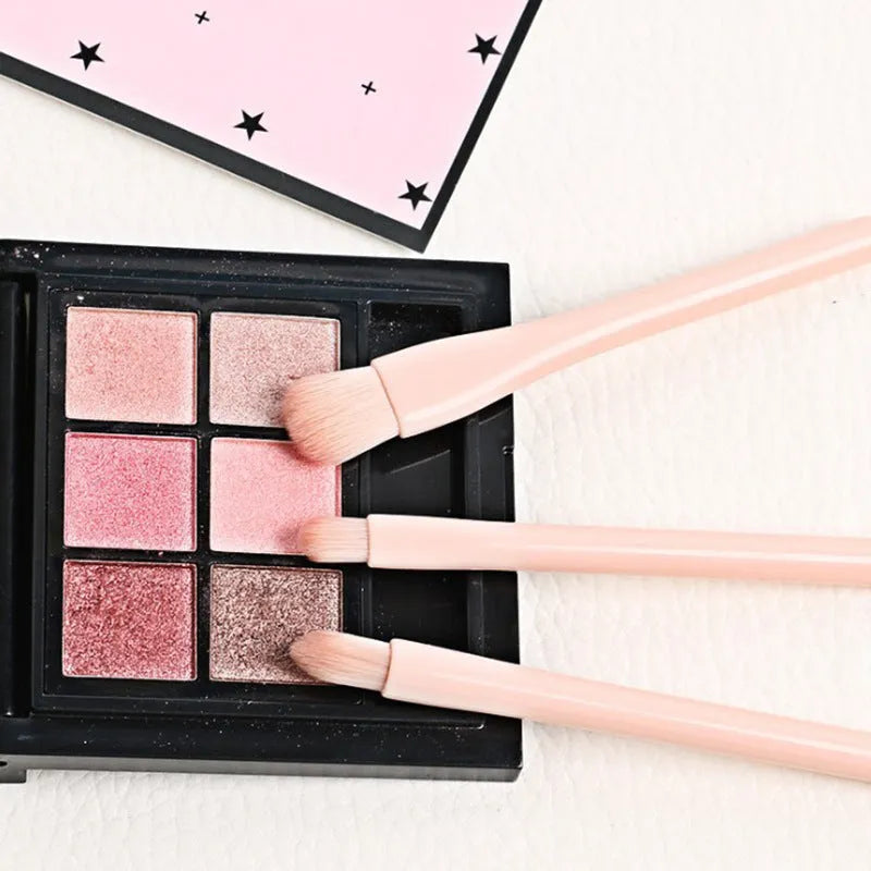 Single 4-in-1 retractable makeup brush set with man-made fibre bristles and plastic handle, 14cm total length