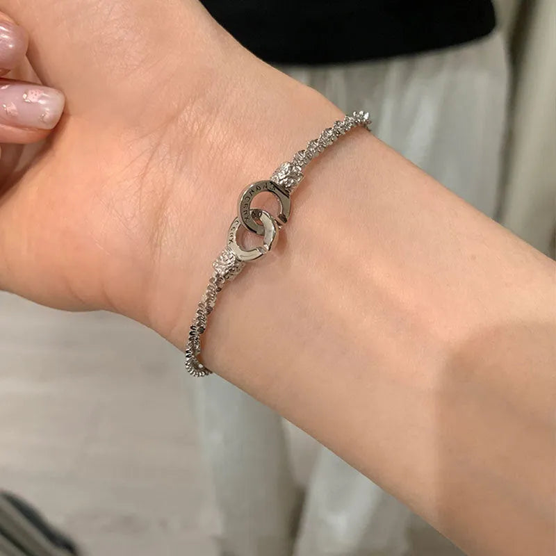Alloy double ring lock bracelet for women with electroplated finish in Korean style