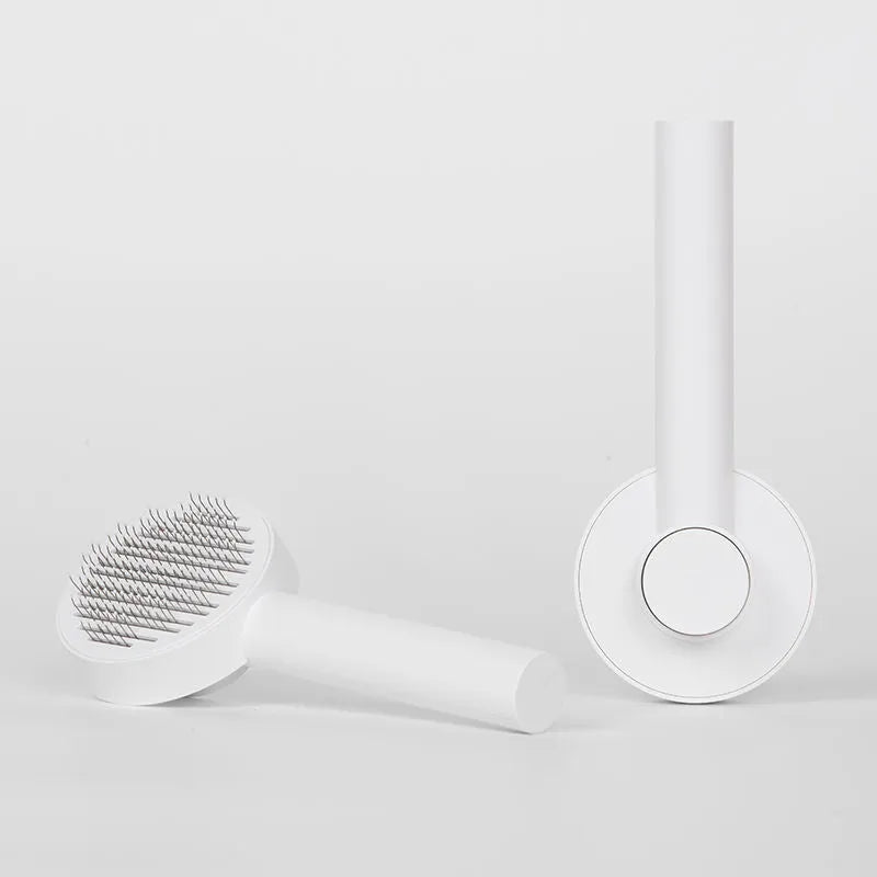 Self-cleaning pet comb with round handle and stainless steel sticky bead teeth in blue