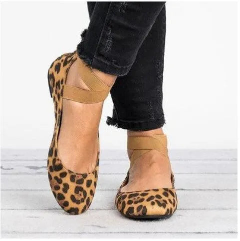 Women's leopard print PU flat shoes with elastic strap and round toe, side view