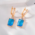 Square quadrilateral geometry earrings with electroplated gold or silver finish on copper construction