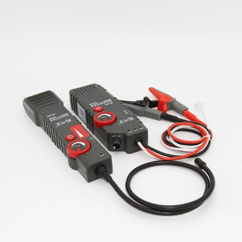 Line finder buried wire cable tester with transmitter and receiver on a workbench