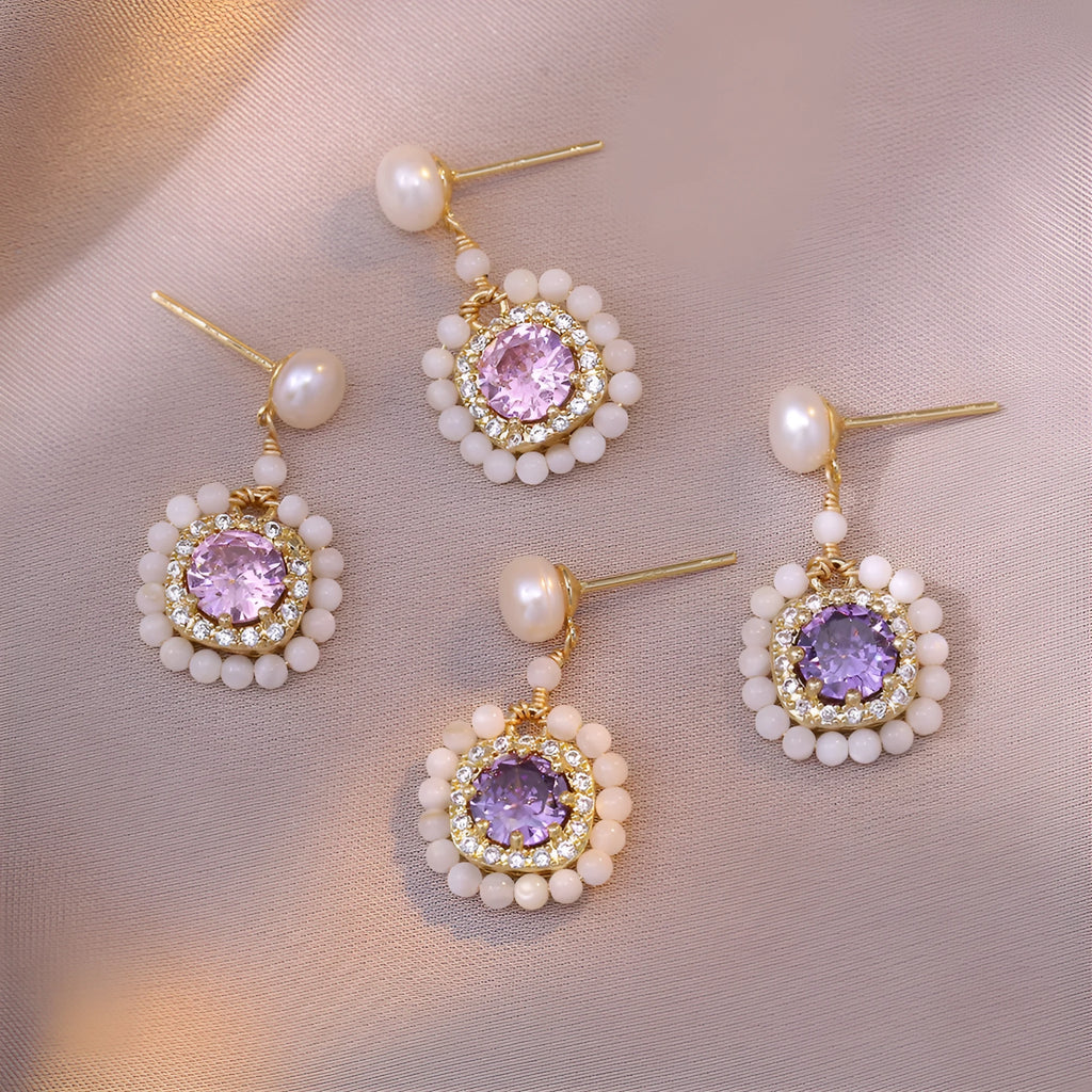 Natural freshwater pearl flower-shaped earrings in purple with diamond treatment finish