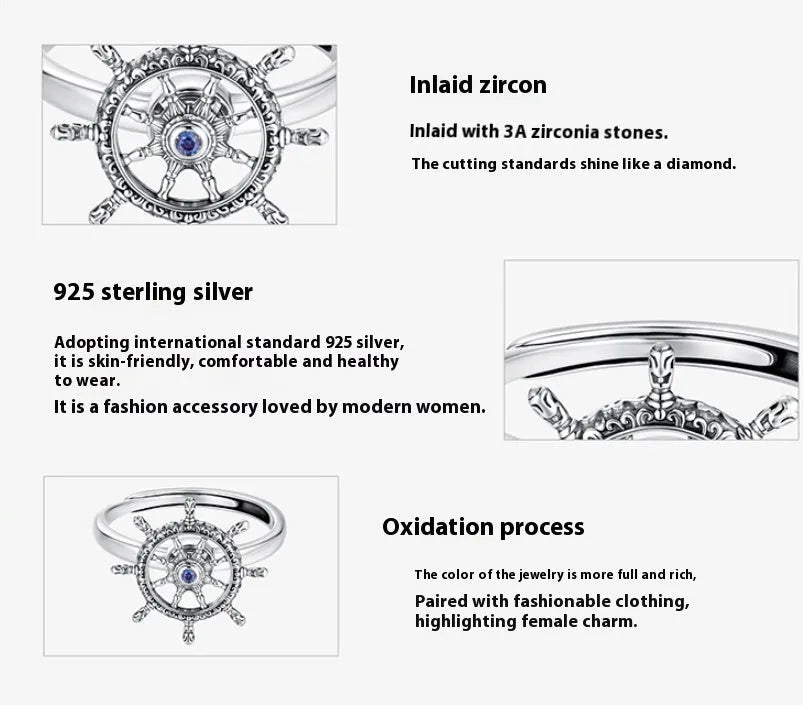 Retro women's silver ring with rotatable rudder design and inlaid zircon stone on open mouth band.