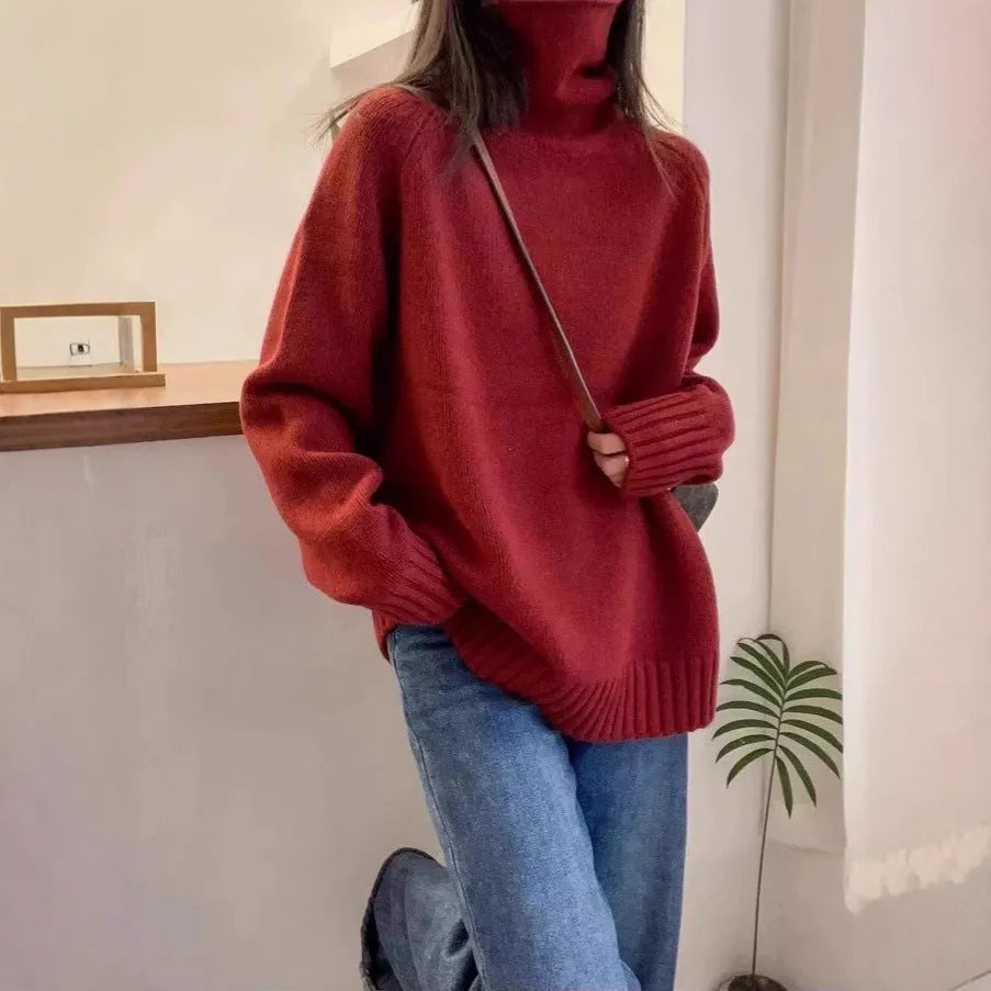 Women's loose turtleneck sweater with thick curling pile collar in red colour