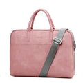 Faux leather medium shoulder laptop bag in black with zipper, plain finish, multiple interior pockets