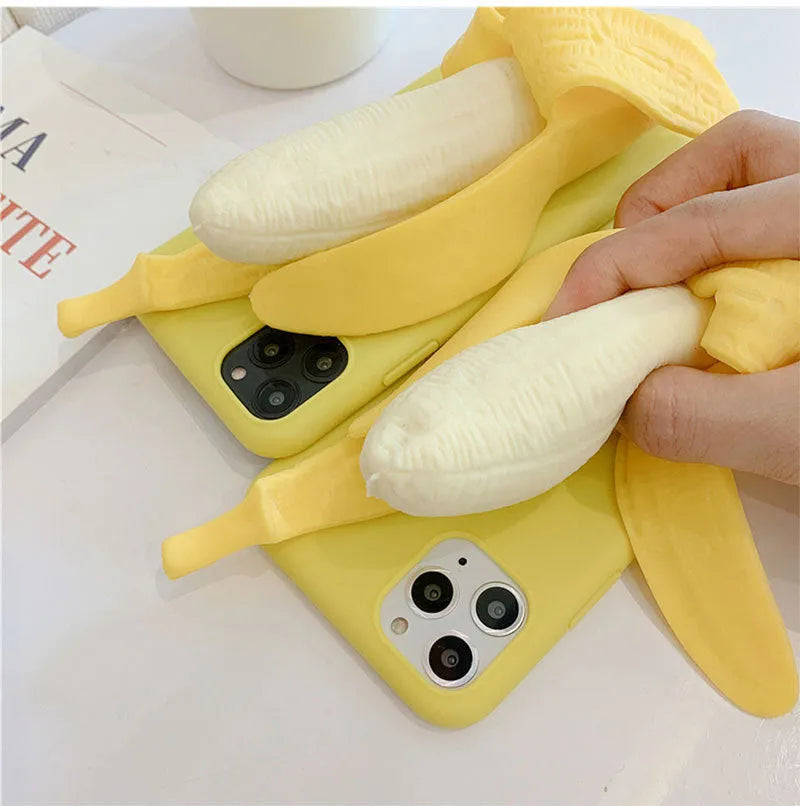 Unzip banana silicone phone case in bright yellow for iPhone, showing realistic unzip detail and soft TPU back protector