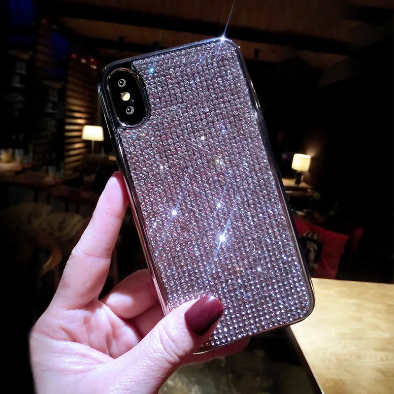 Silver rhinestone decorated silicone phone case for iPhone models showing full diamond pattern
