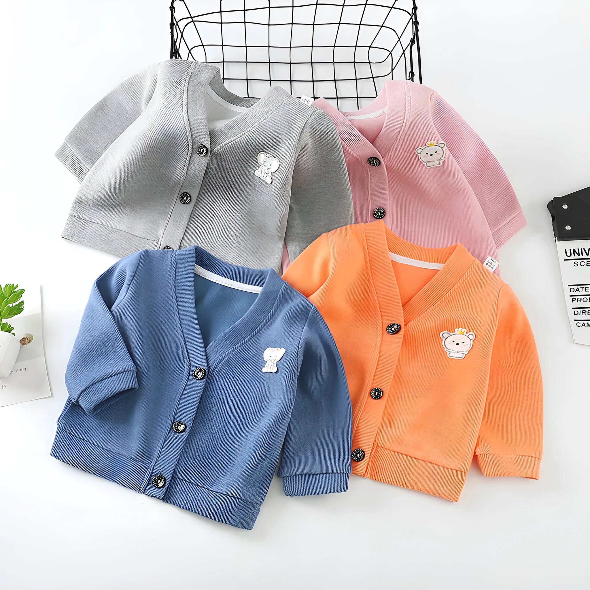 Baby girls cotton cardigan in blue with long sleeves and single-breasted closure, soft treatment finish