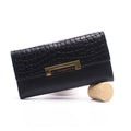 Women's first layer cowhide long wallet with buckle closure, 15 card slots, stone pattern texture, black colour