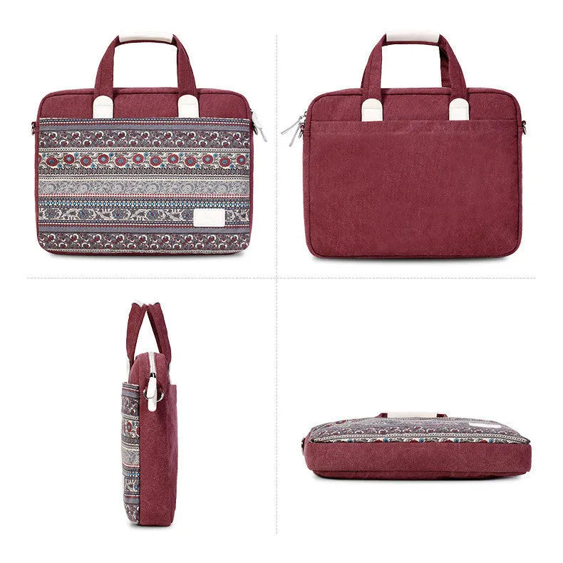 Ethnic style canvas laptop bag in lake blue with zippered front pocket on a table