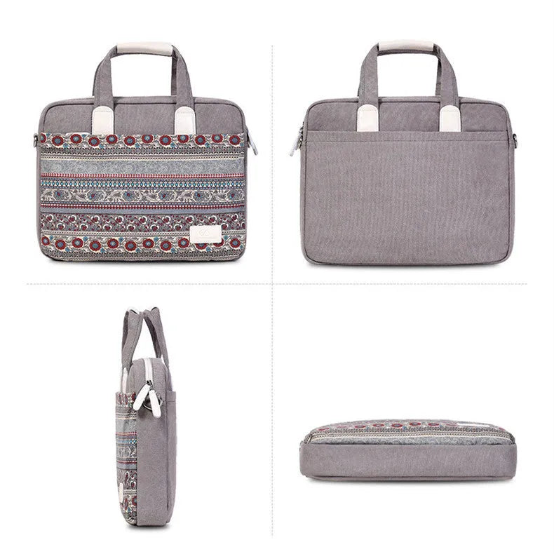 Ethnic style canvas laptop bag in lake blue with zippered front pocket on a table