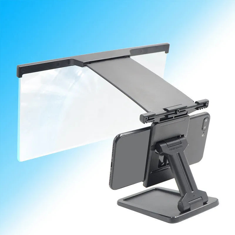 Black L20 split mobile phone screen magnifier with acrylic lens and separate ABS support bracket on a table.