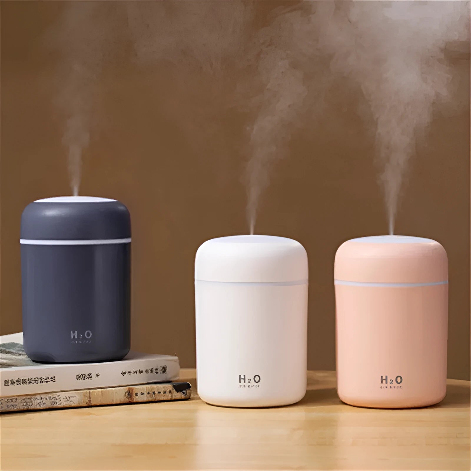 Pink, white or navy blue car humidifier with USB cable, water tank, and colourful LED lights