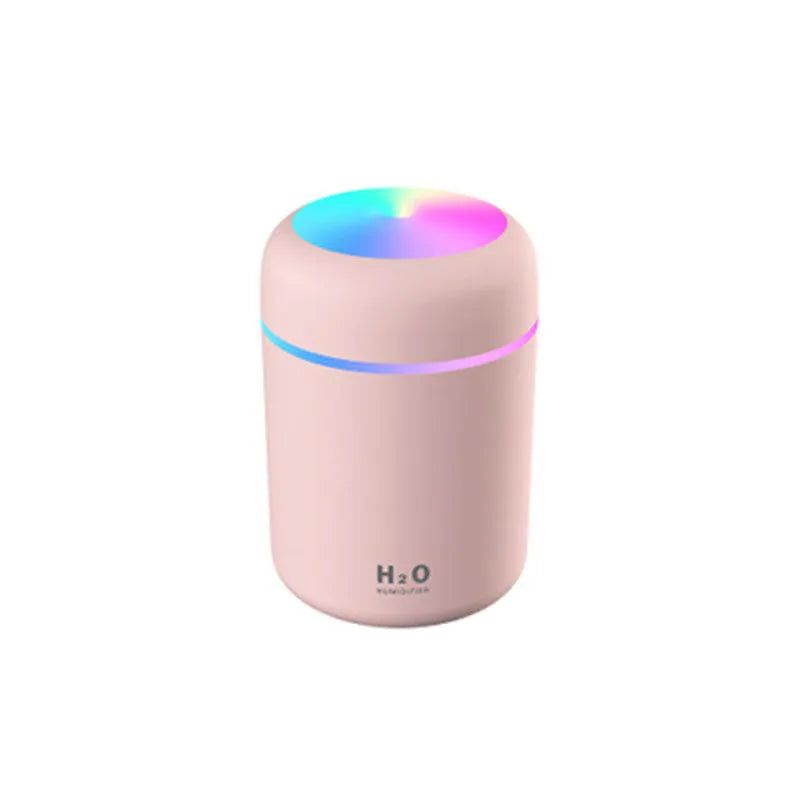 Pink, white or navy blue car humidifier with USB cable, water tank, and colourful LED lights