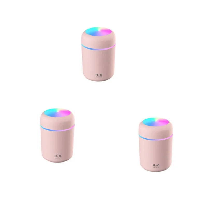 Pink, white or navy blue car humidifier with USB cable, water tank, and colourful LED lights