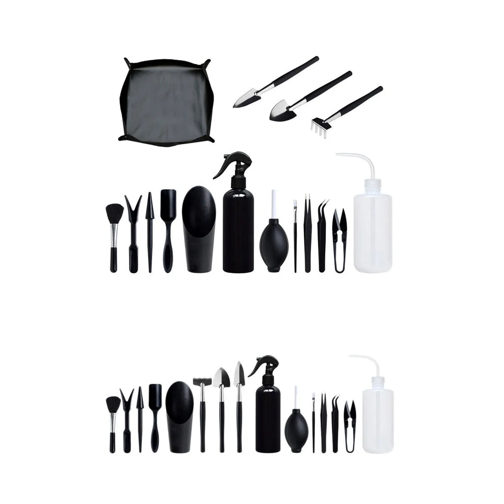 Black plastic and metal mini garden tool set with 16 pieces including tweezers, shovels, brushes, bottles, and a square work cushion for succulent care.