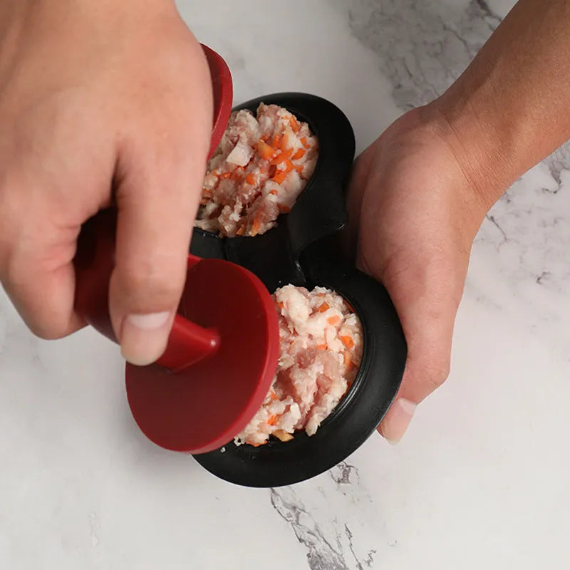 Black and red round burger press with non-stick surface and oil paper liners.