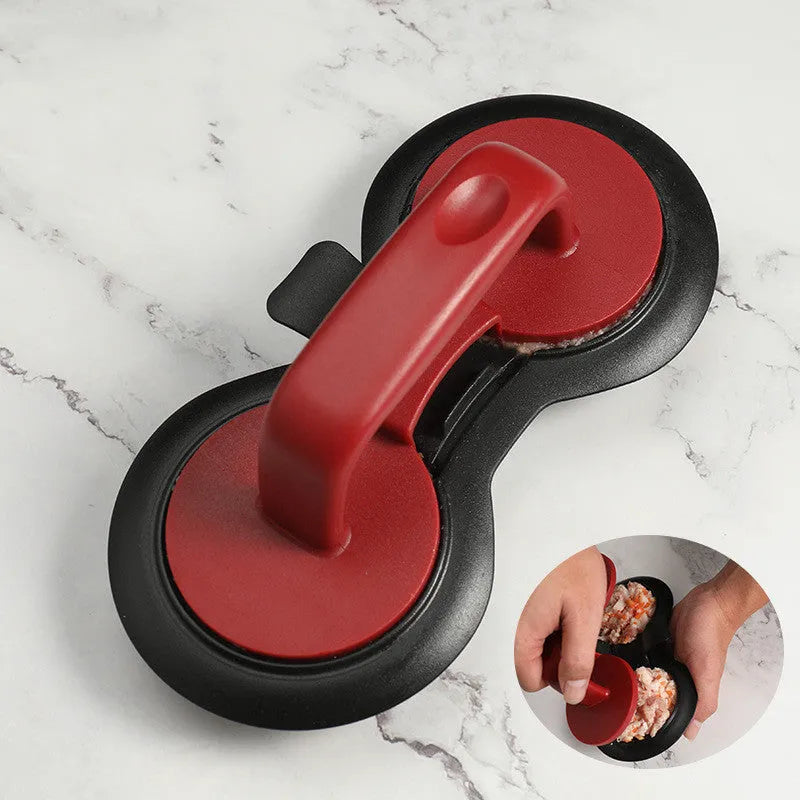 Black and red round burger press with non-stick surface and oil paper liners.