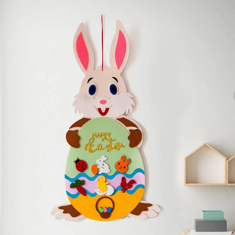 Easter DIY felt bunny pendant with detachable egg patches and letters on a light pink background