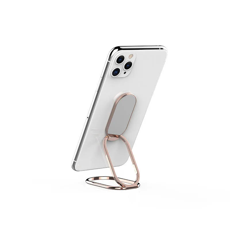 Metal ring buckle holder foldable lazy phone stand with magnetic function in silver on a desk