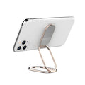 Metal ring buckle holder foldable lazy phone stand with magnetic function in silver on a desk