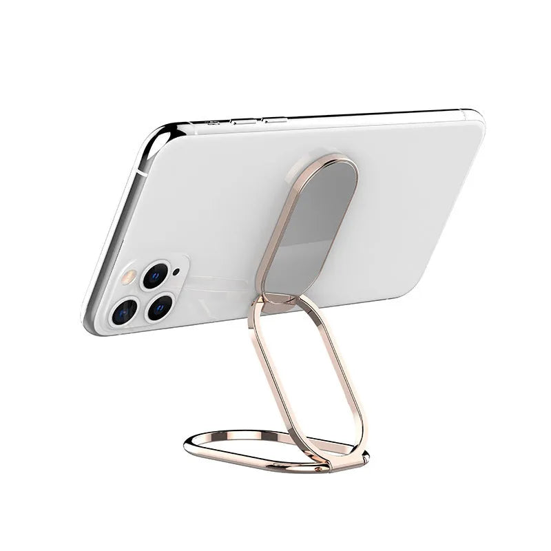 Metal ring buckle holder foldable lazy phone stand with magnetic function in silver on a desk
