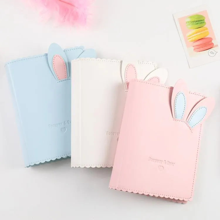 Mini rabbit-themed photo album with PU leather cover holding 3-inch photographs