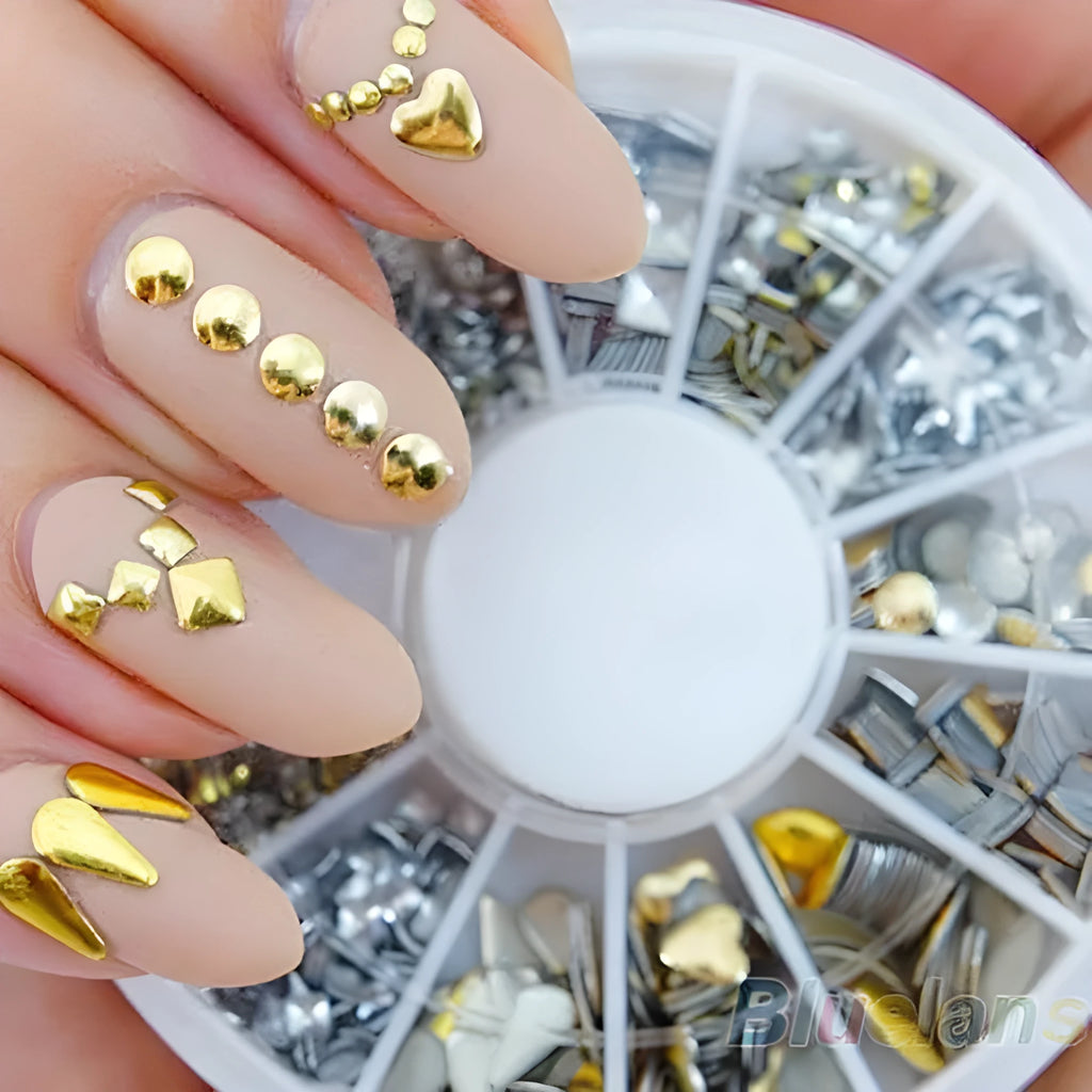 DIY decorative nail art stickers in gold and silver acrylic on a white background