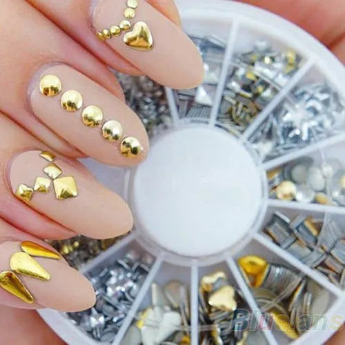 DIY decorative nail art stickers in gold and silver acrylic on a white background