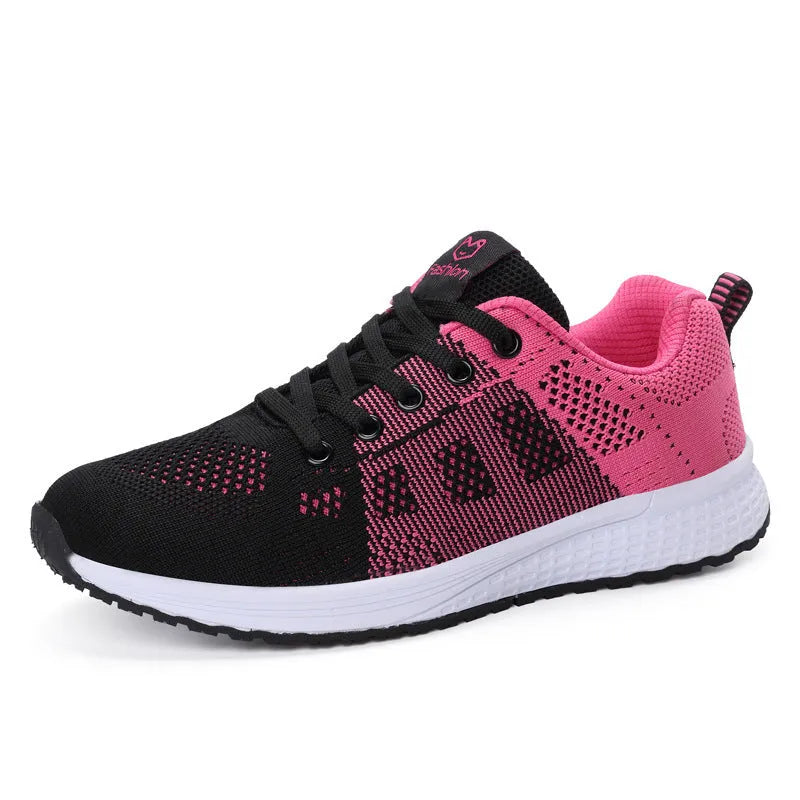 Women's white high top casual shoes with mesh-like net top design and cross bind strap detail.