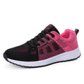 Women's white high top casual shoes with mesh-like net top design and cross bind strap detail.