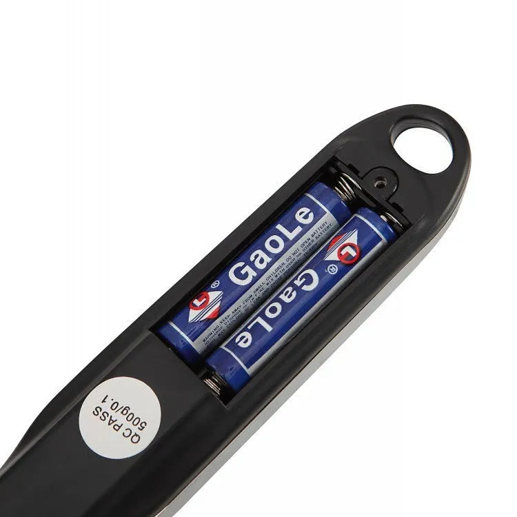 Smart digital measuring spoon with built-in electronic scale showing 0-30ml volume capacity