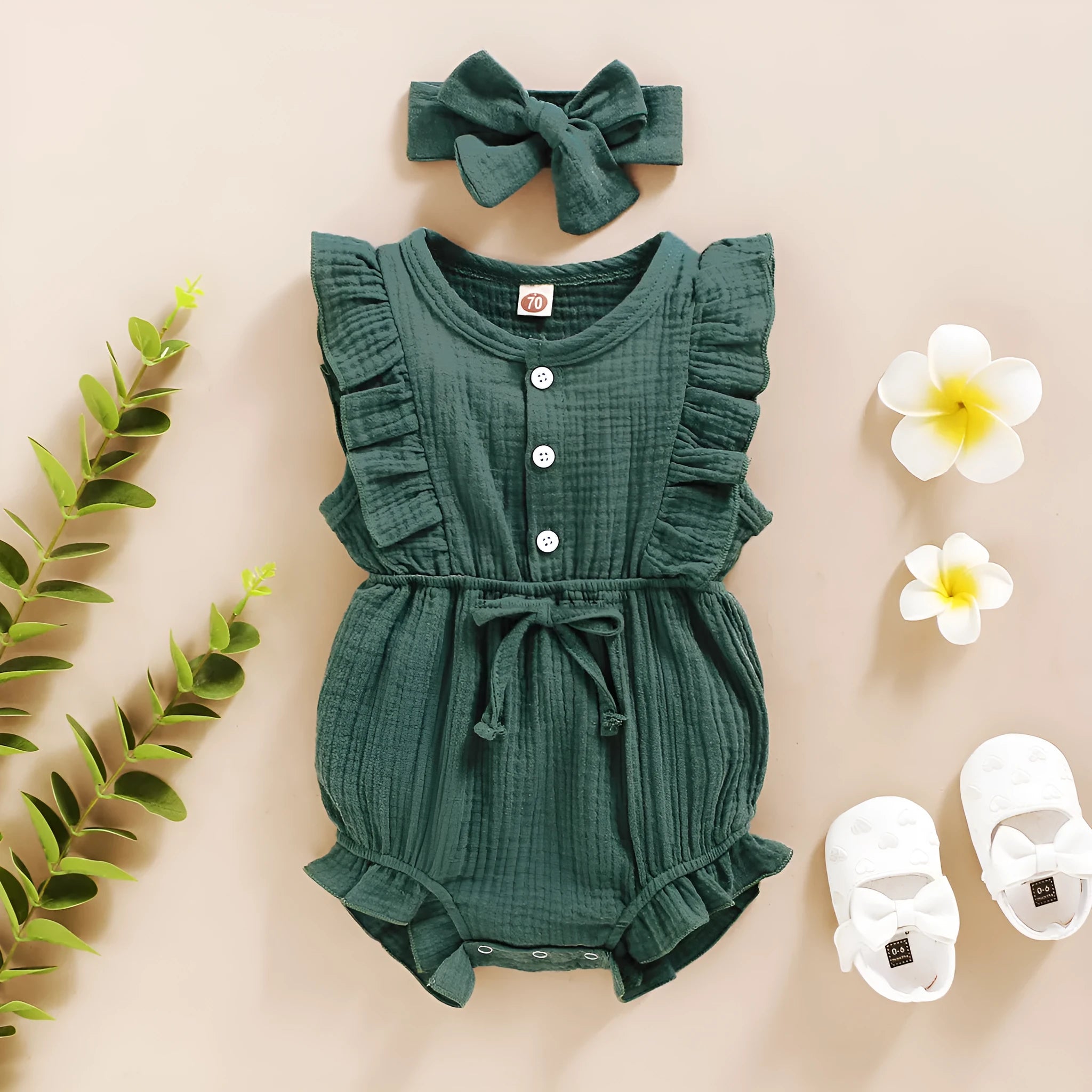 Baby girl cotton triangle romper with lace sleeves and ruffled trim in green colour, includes headwear