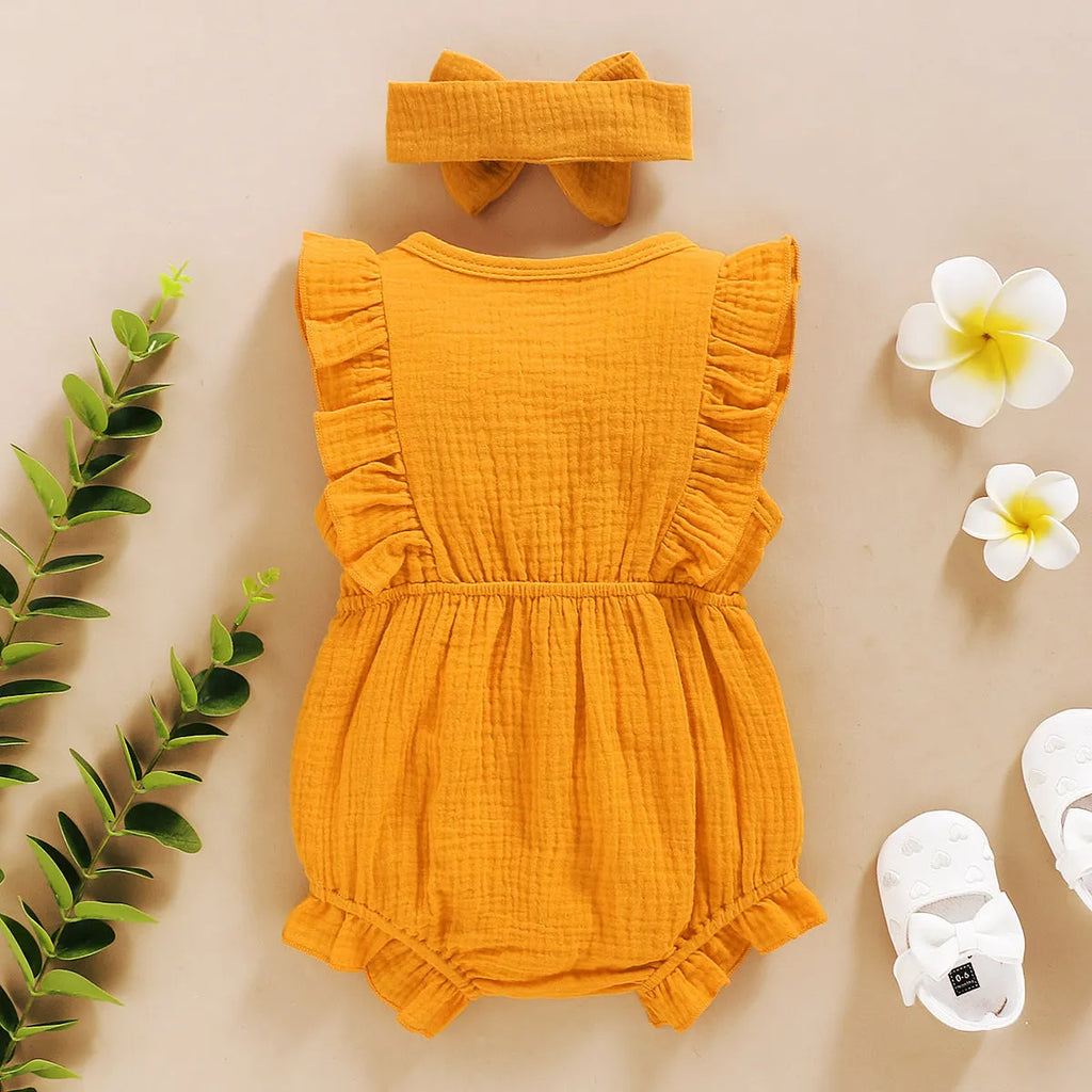Baby girl cotton triangle romper with lace sleeves and ruffled trim in green colour, includes headwear