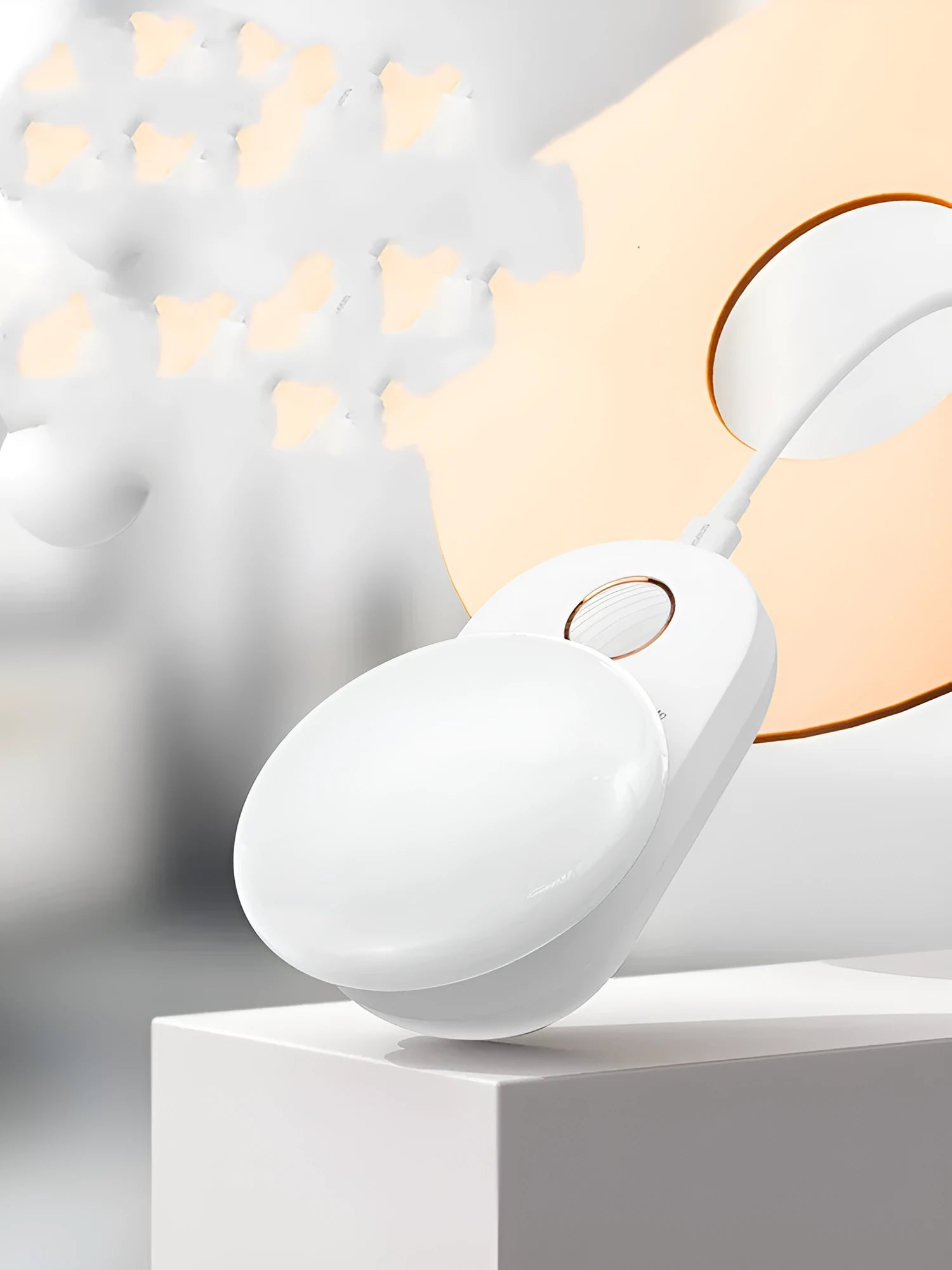 White rechargeable LED night light with motion sensor for bedroom bedside use.