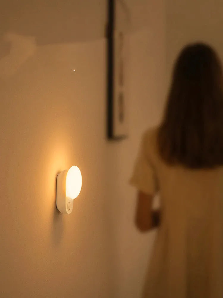 White Baseus rechargeable sensor night light with LED and motion detection.