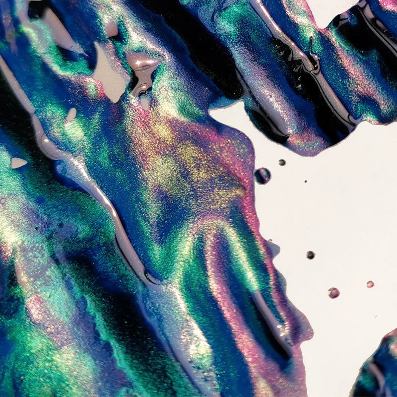 Bottle of strong sheen gradient fountain pen ink with gold powder particles in Red Tide or Truffle colour