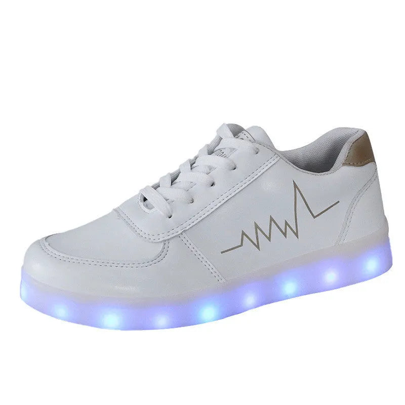 Women's USB-charging LED luminous shoes in gold with low-top lace-up design and round toe on a white background