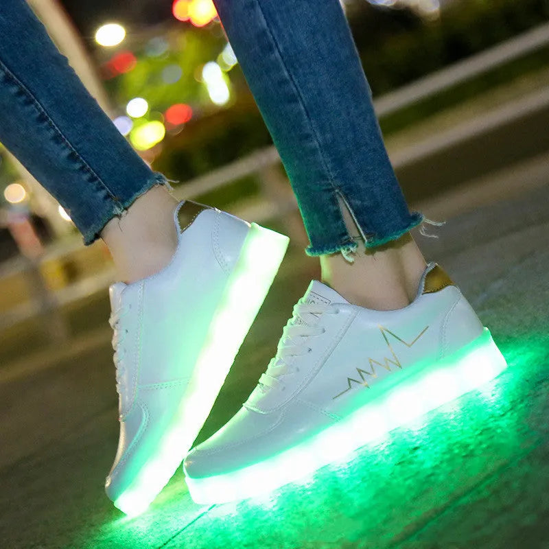 Women's USB-charging LED luminous shoes in gold with low-top lace-up design and round toe on a white background