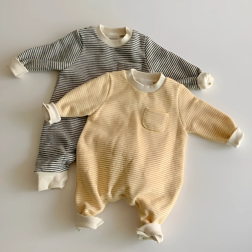 Striped fleece baby jumpsuit in yellow or black with long sleeves and hidden buttons