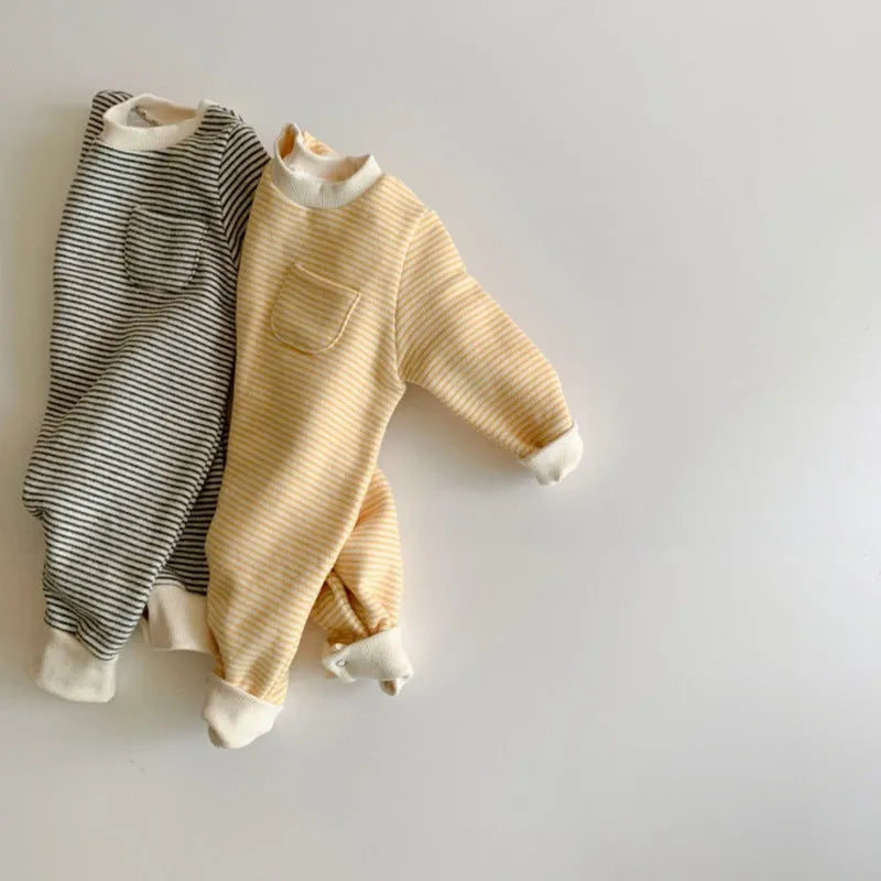 Striped fleece baby jumpsuit in yellow or black with long sleeves and hidden buttons