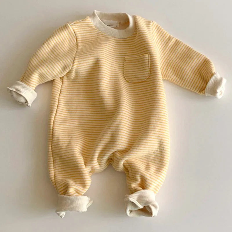 Striped fleece baby jumpsuit in yellow or black with long sleeves and hidden buttons
