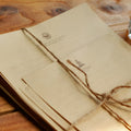 Brown vintage kraft paper stationery set with ten large sheets and two small notes in Chinese envelope style