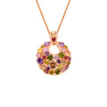 Geometric copper pendant necklace with clear zircon stones, rose gold electroplated finish, on display