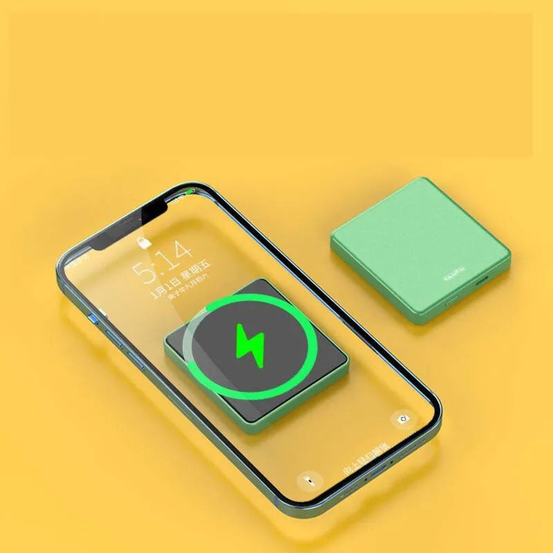 Mini magnetic wireless power bank in blue, displaying 5000mAh capacity and USB ports on a neutral background
