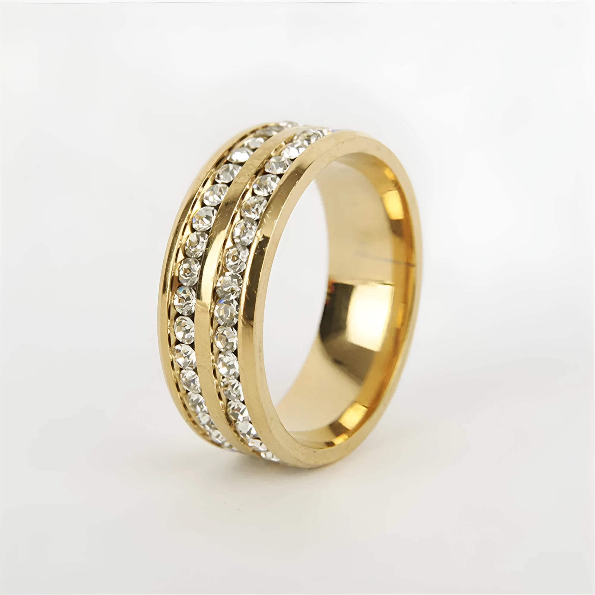 Geometric couple ring with diamond-cut alloy band and artificial gemstone inlay on a white background