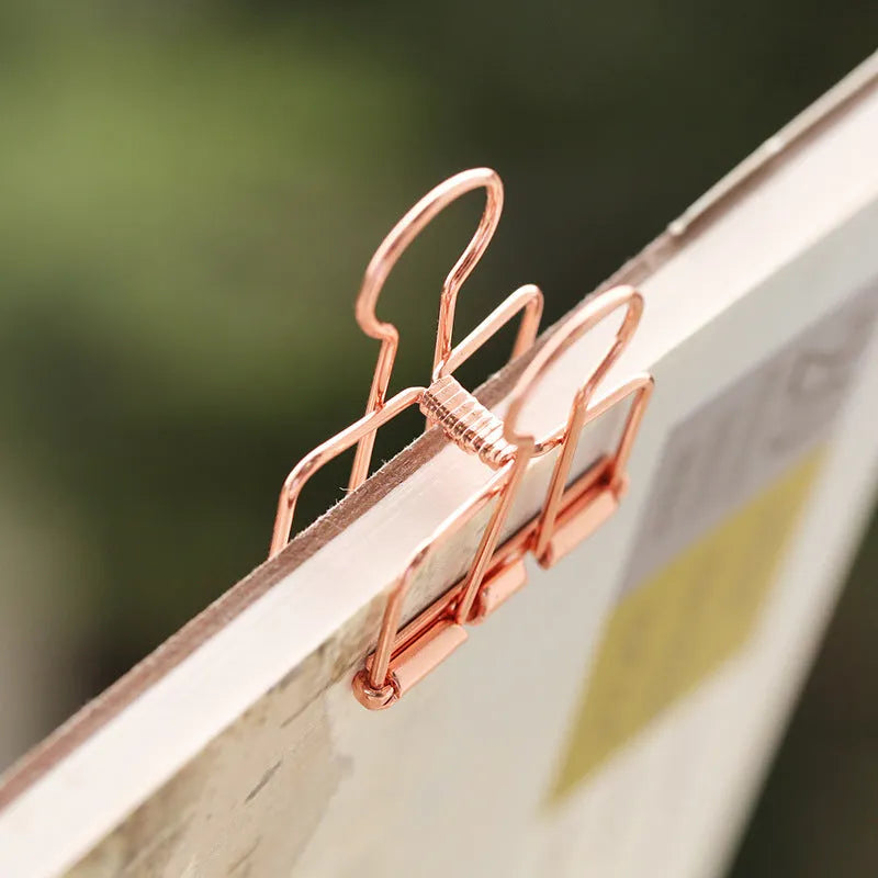 Rose gold metal binder set with ticket holder and data folder, small and large sizes on white background